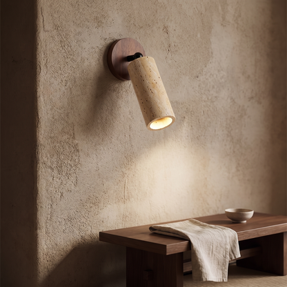 Wabi-Sabi Stone and Wood Wall Lamp on a clay plaster wall