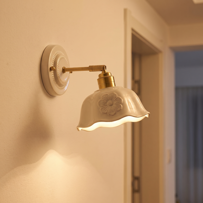 Nordic Cream Ceramic Wall Lamp with flower motif in a hallway