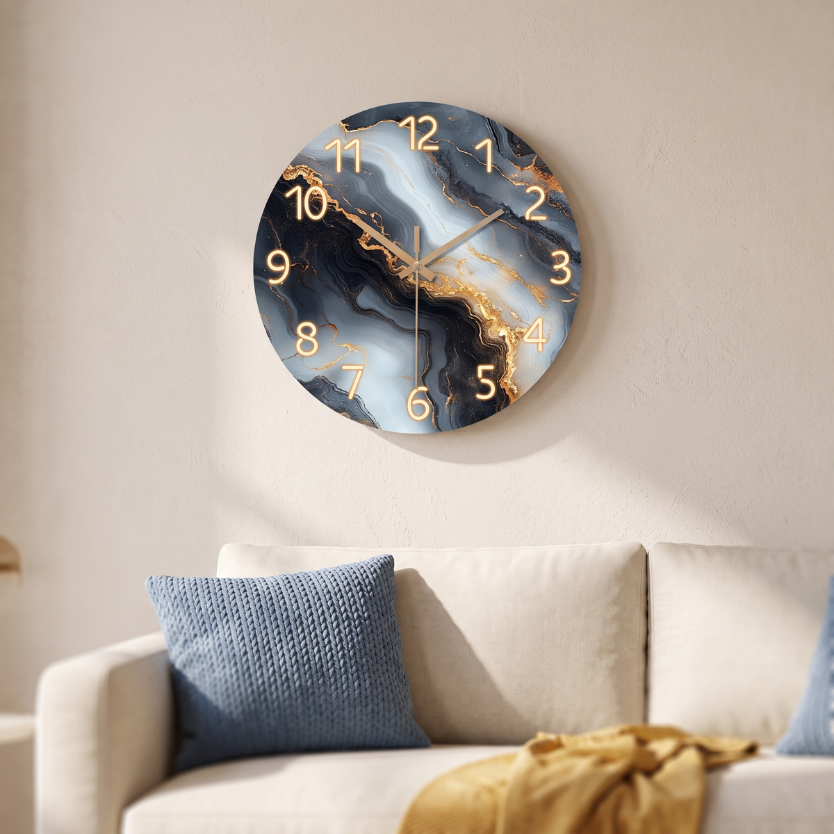 Blue and Gold Marble-Look Wall Clock above a sofa